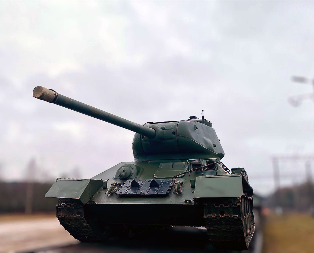 A troop train carrying T-34 tanks intended for a military parade being unloaded at Ozerishche station, 1 of 5