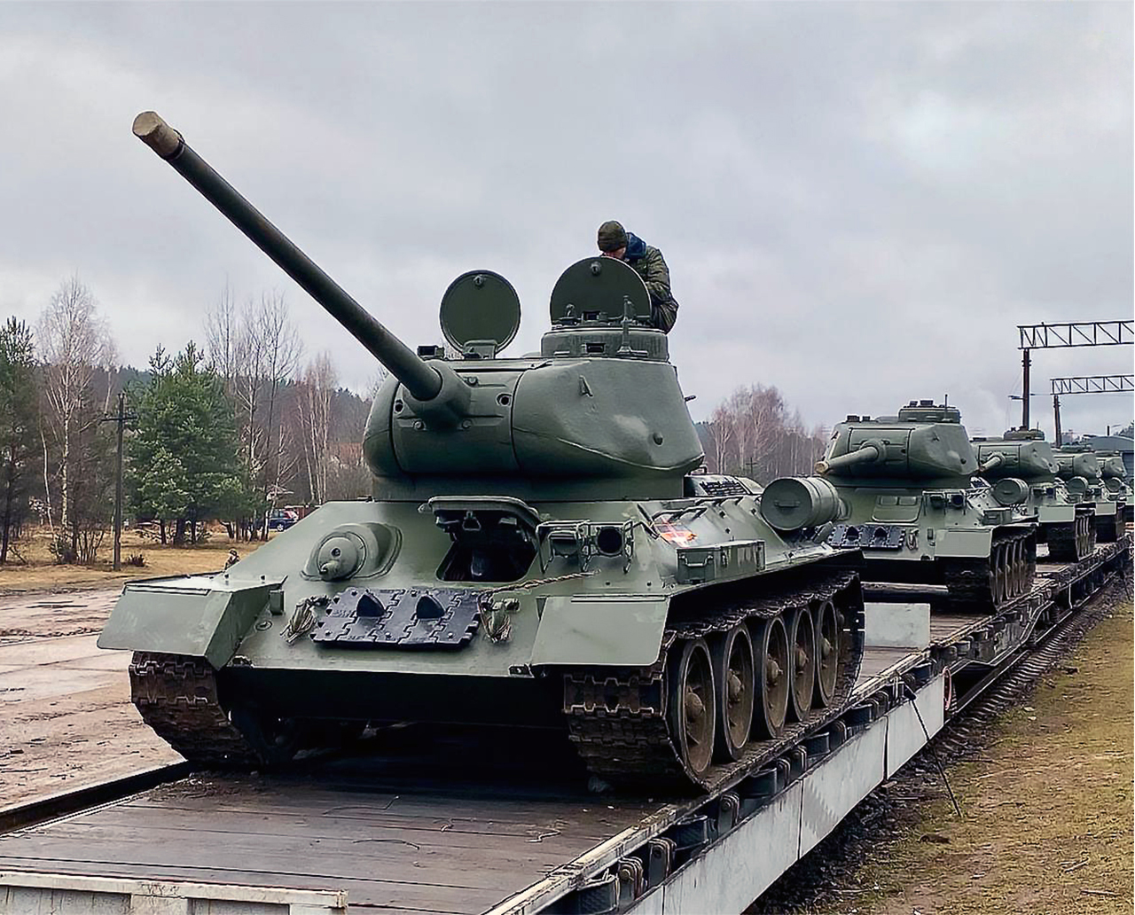 A troop train carrying T-34 tanks intended for a military parade being unloaded at Ozerishche station, 4 of 5
